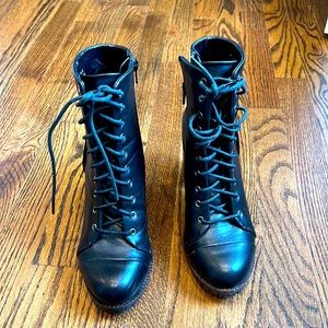 Report women’s black heeled boots